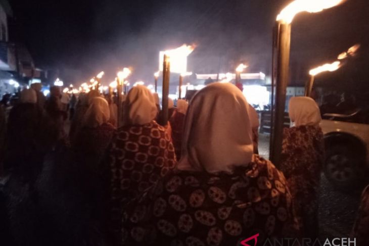 Sambut Tahun Baru Islam masyarakat pawai obor
