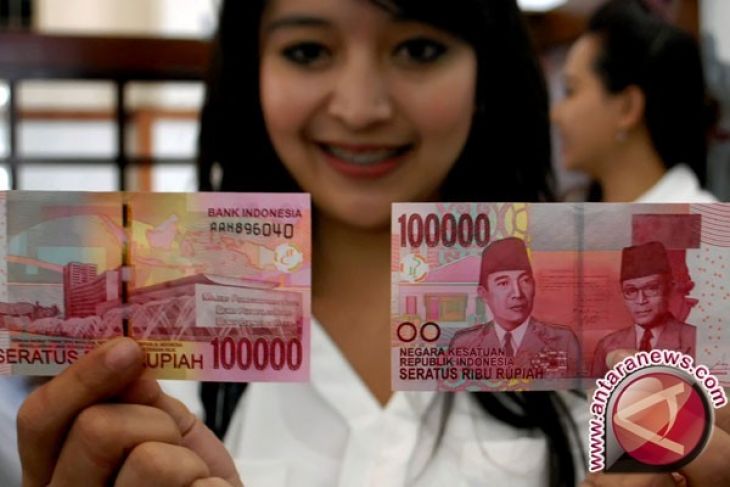 Nilai tukar Rupiah menguat tipis, dibayangi perang dagang