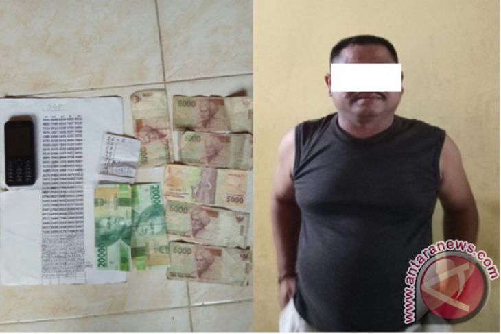 Tukang Ojek Merangkap Bandar Judi Togel Diciduk Polisi
