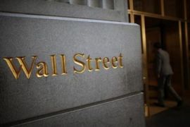 Wall street bervariasi di tengah laporan laba dan data ekonomi
