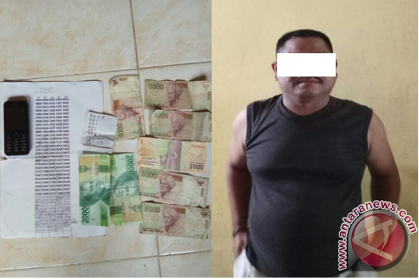 Tukang Ojek Merangkap Bandar Judi Togel Diciduk Polisi
